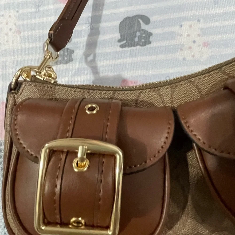 Coach Brown Signature Canvas Shoulder Bag with Double Buckle Pockets